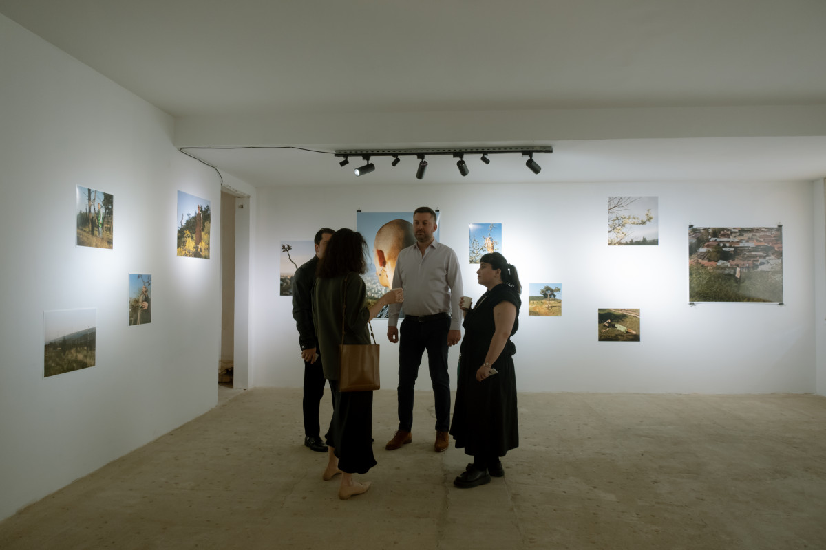 Visitors at Barrie Hullegie’s photo exhibition