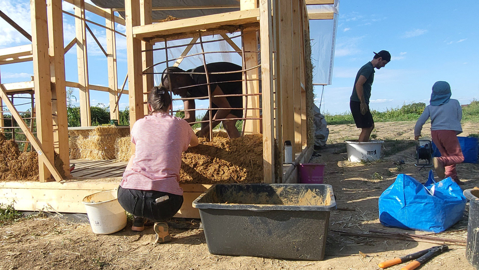 Hands-on earthen and straw-bale construction